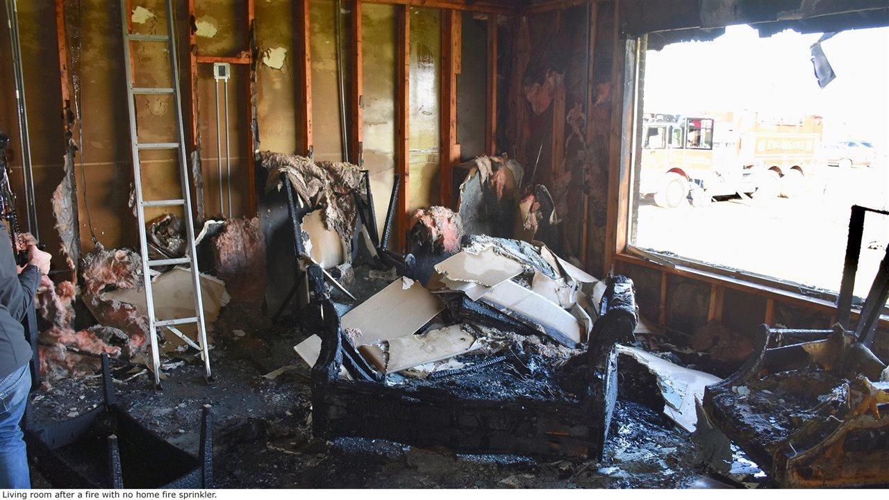 Burned out living room in a house without home fire sprinklers. House fires become deadly in as little as two minutes, leaving little time to escape.