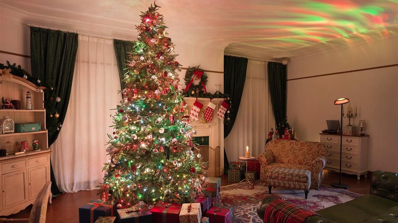 Govee LED lighted Christmas tree in a living room.