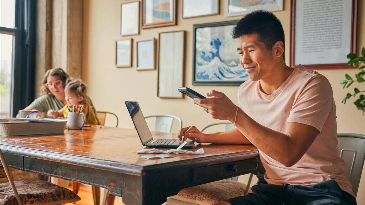 Man using a laptop at dinner table.Turbo Tax says people who rush to file their taxs may leave out important information.