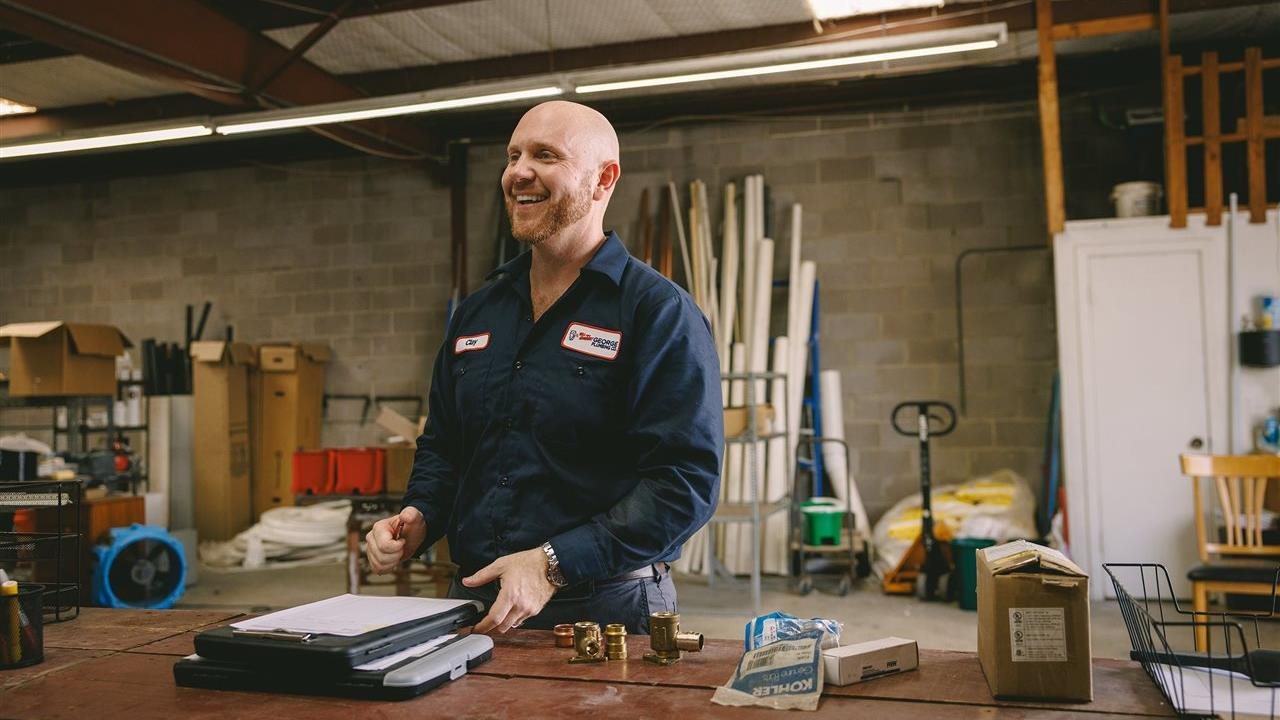 Clay working in busy warehouse. Crypto currancy is becoming mainstream, moving from a novel concept into an everyday financial tool.