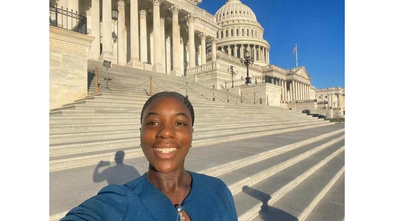 Jen on the steps of the Capitol Building. Jen was diagnosed with chronic hand eczema (CHE) when she was 15.