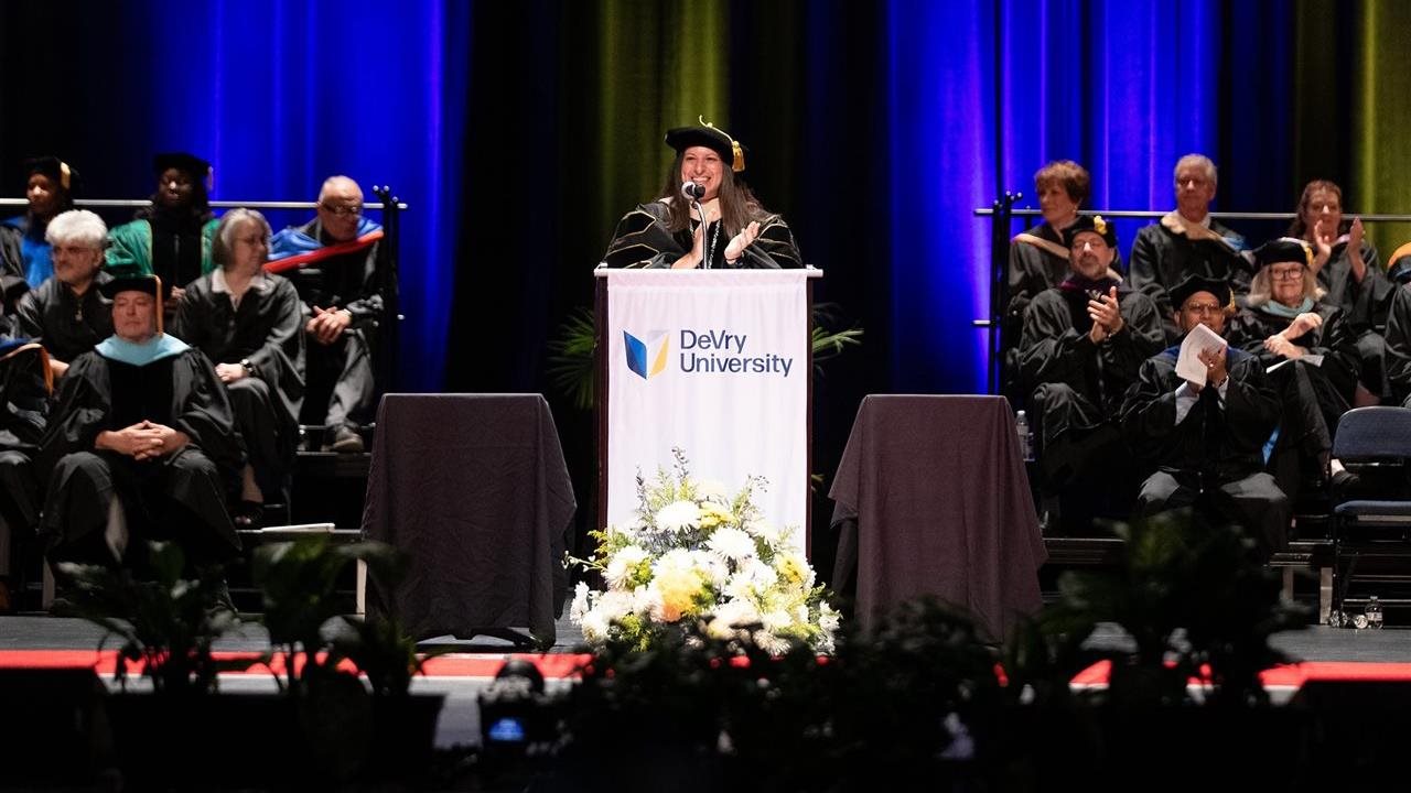 Elise Awwad, president and CEO of DeVry University, speaking June 7th at commencement exercises.