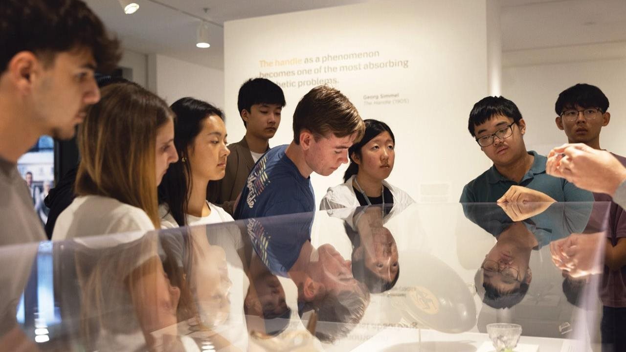Teen students from Stanford Online High School on a field trip in a museum.