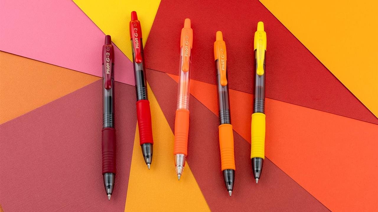 Family of G2 Fine Pilot Pens with colorful background.