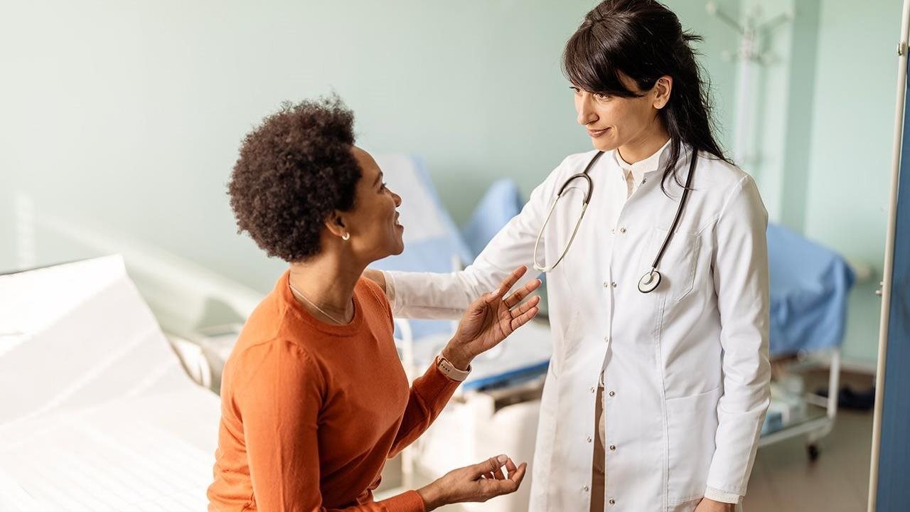 A woman consults with her doctor.