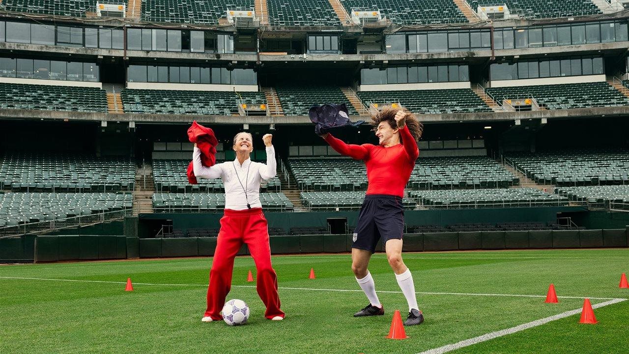 Brandi Chastain and U.S. Soccer player celebrate Certified Frisky on the Field, a summer celebration of soccer and cats.