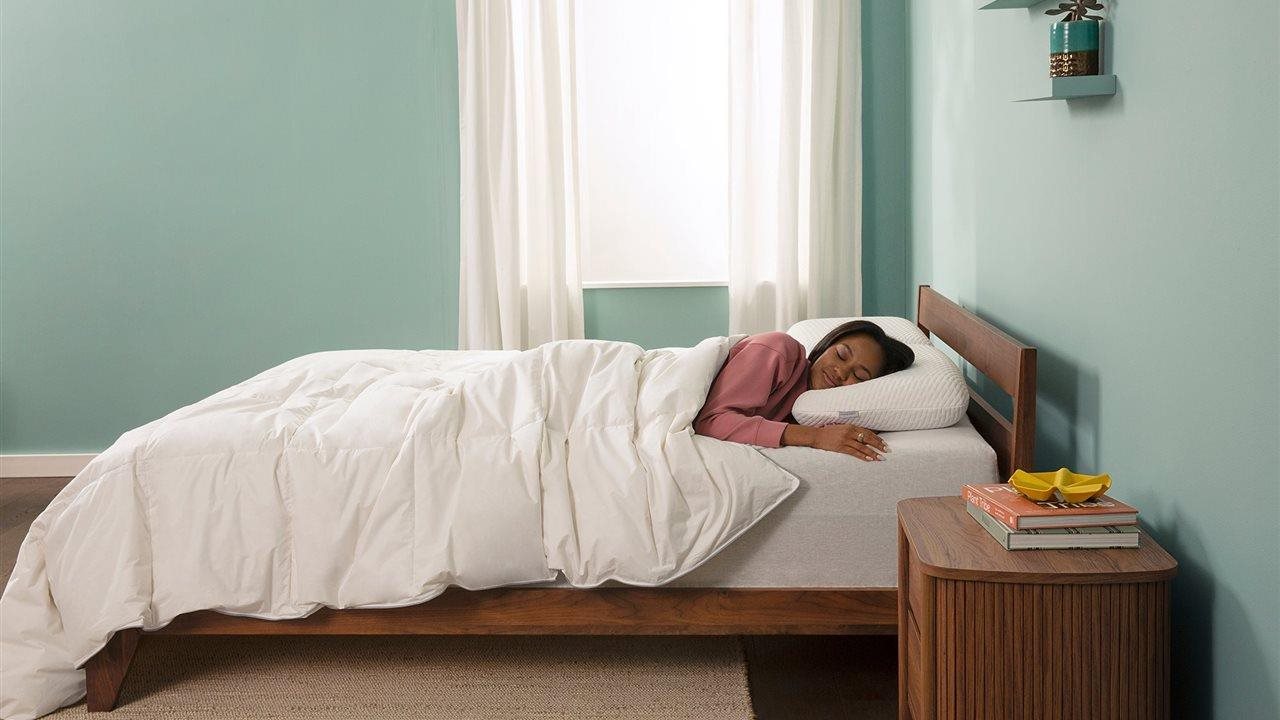 Woman sleeping on Serta Simmons Bedding.