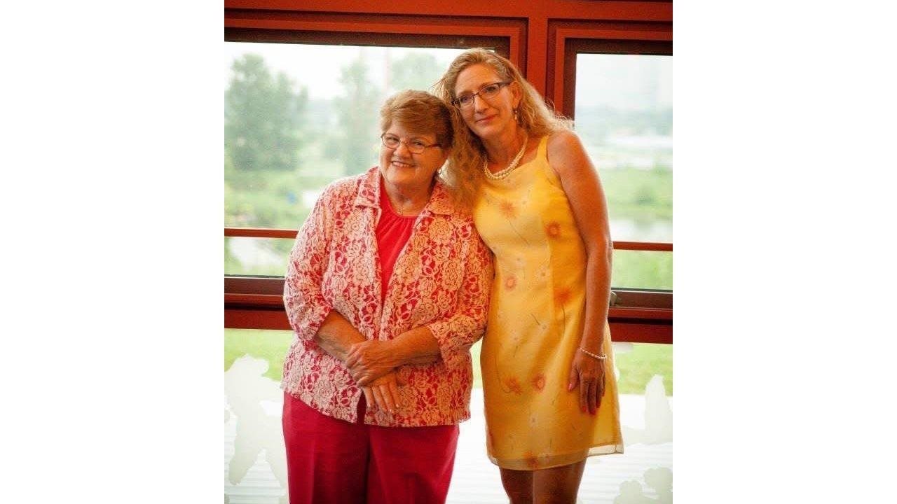 Smiling Helen and Michelle in bright colored clothing. One type of anabolic treatment option, EVENITY® (romosozumab-aqqg), is the first and only medication that works by building new bone and helping to slow bone loss.