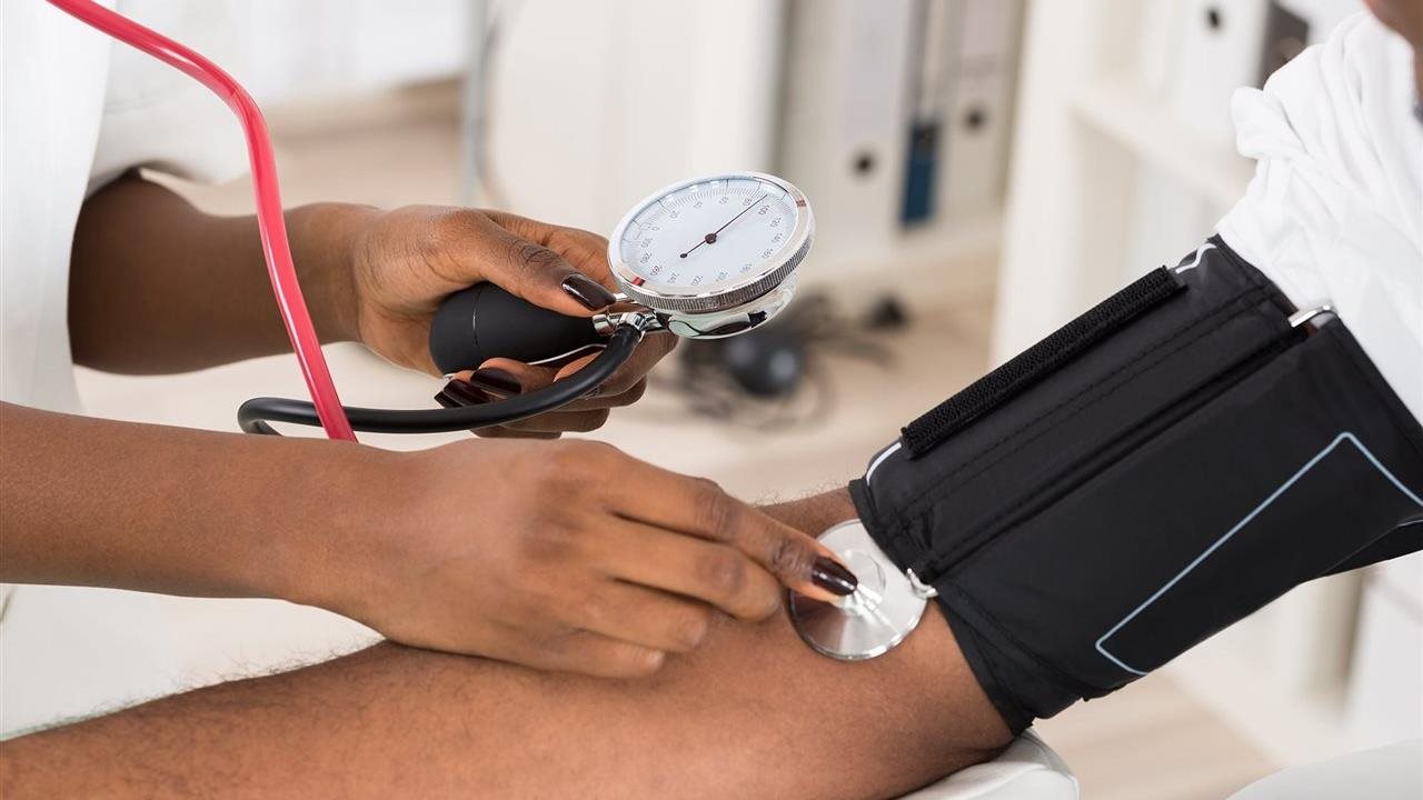 Man getting his blood pressure taken. The Symplicity Spyral™ renal denervation (RDN) procedure is a minimally invasive treatment designed to complement your existing efforts to manage high blood pressure.