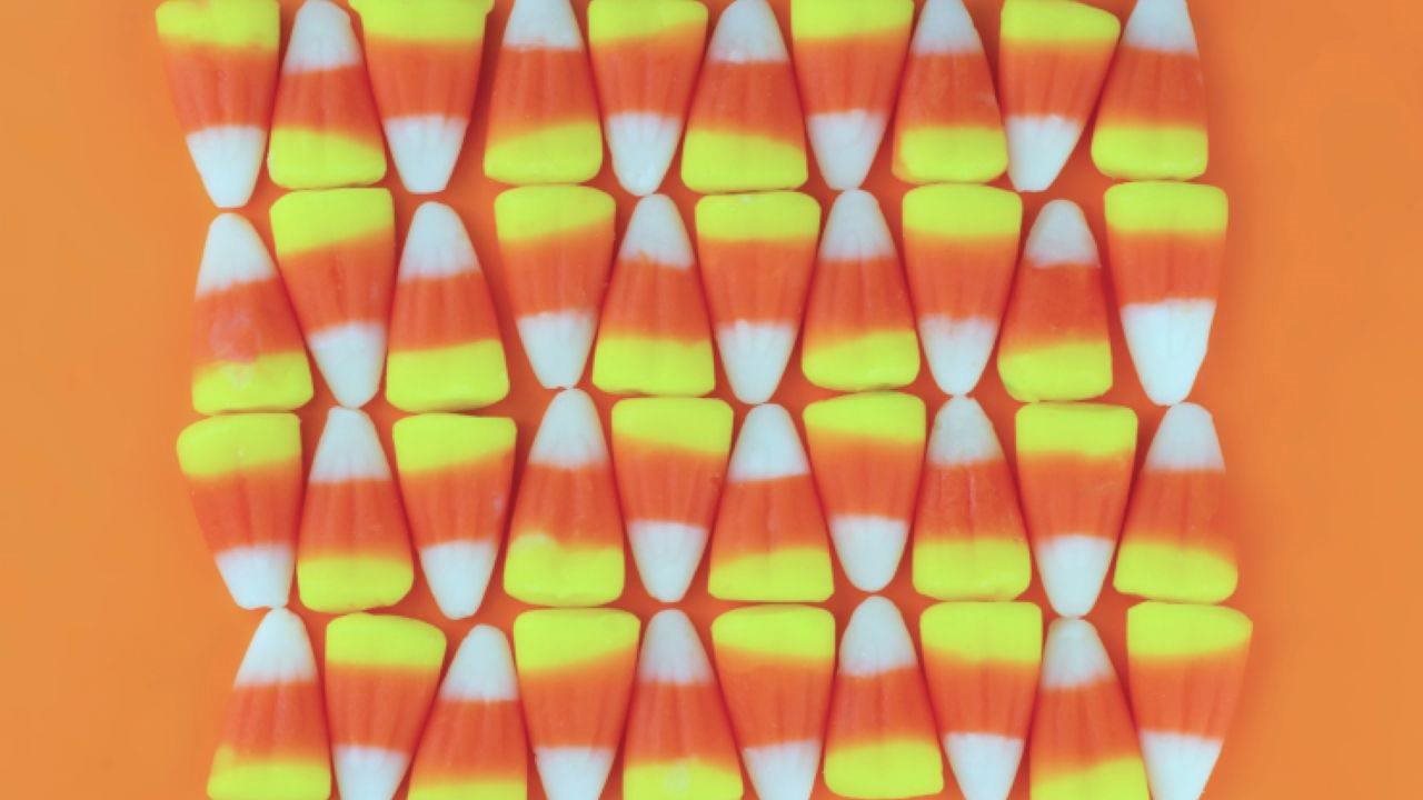 Candy corn stacked in a decorative fashion.