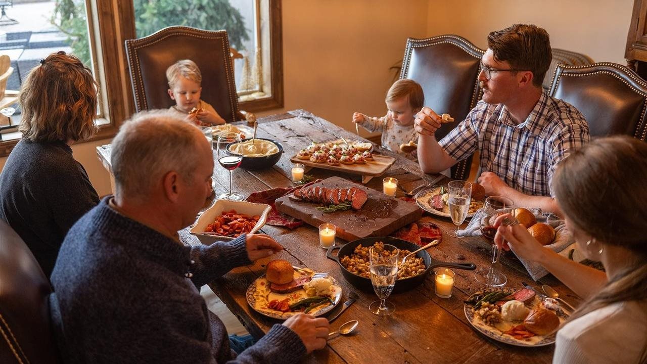Extended family enjoying dinner together.