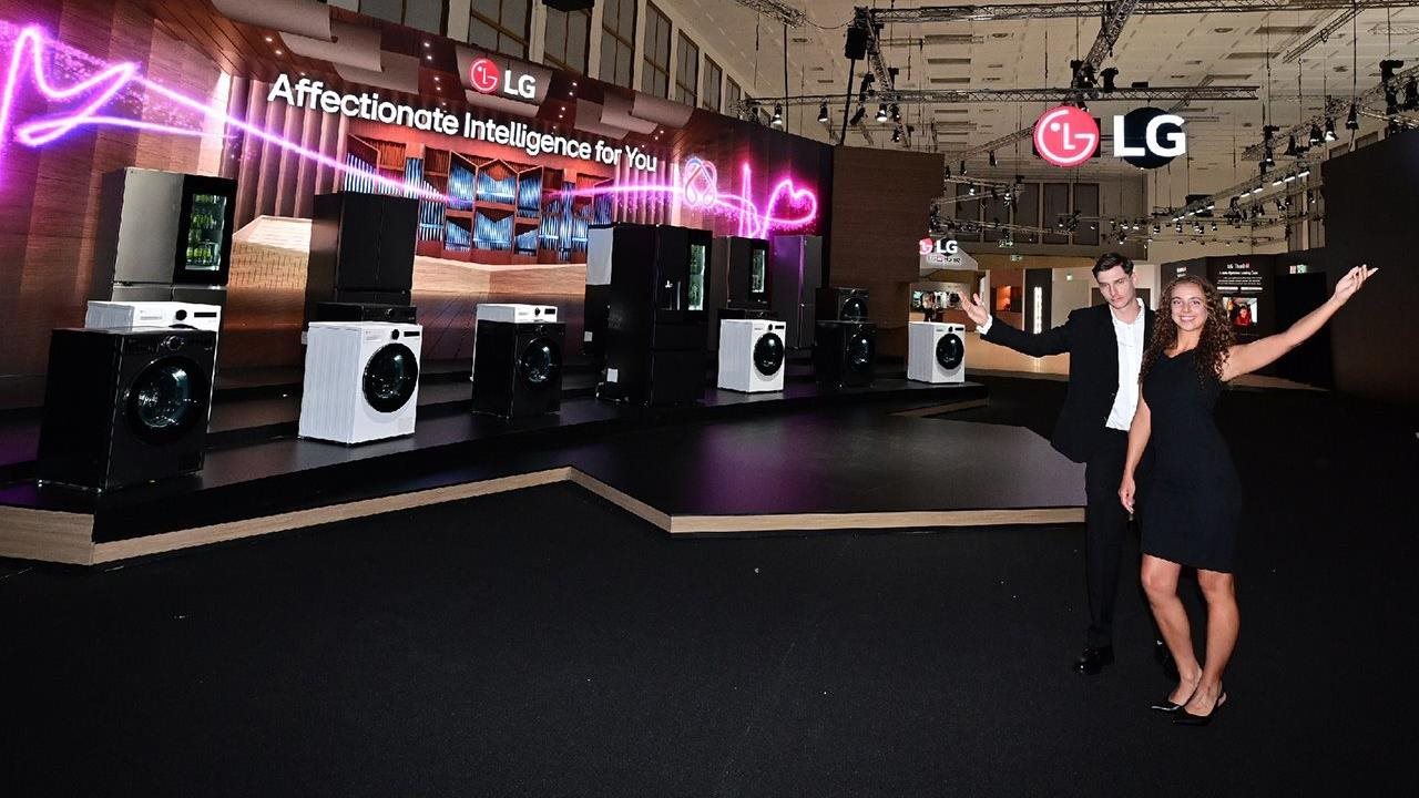LG's booth at the IFA in Berlin with a banner that says "Affectionate Intelligence" over a variety of washers and dryers.
