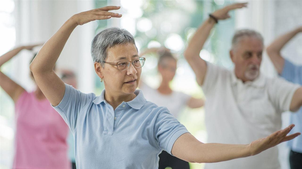Group of seniors practicing Tai chi. The Eldercare Locator is a public service of the Administration for Community Living.